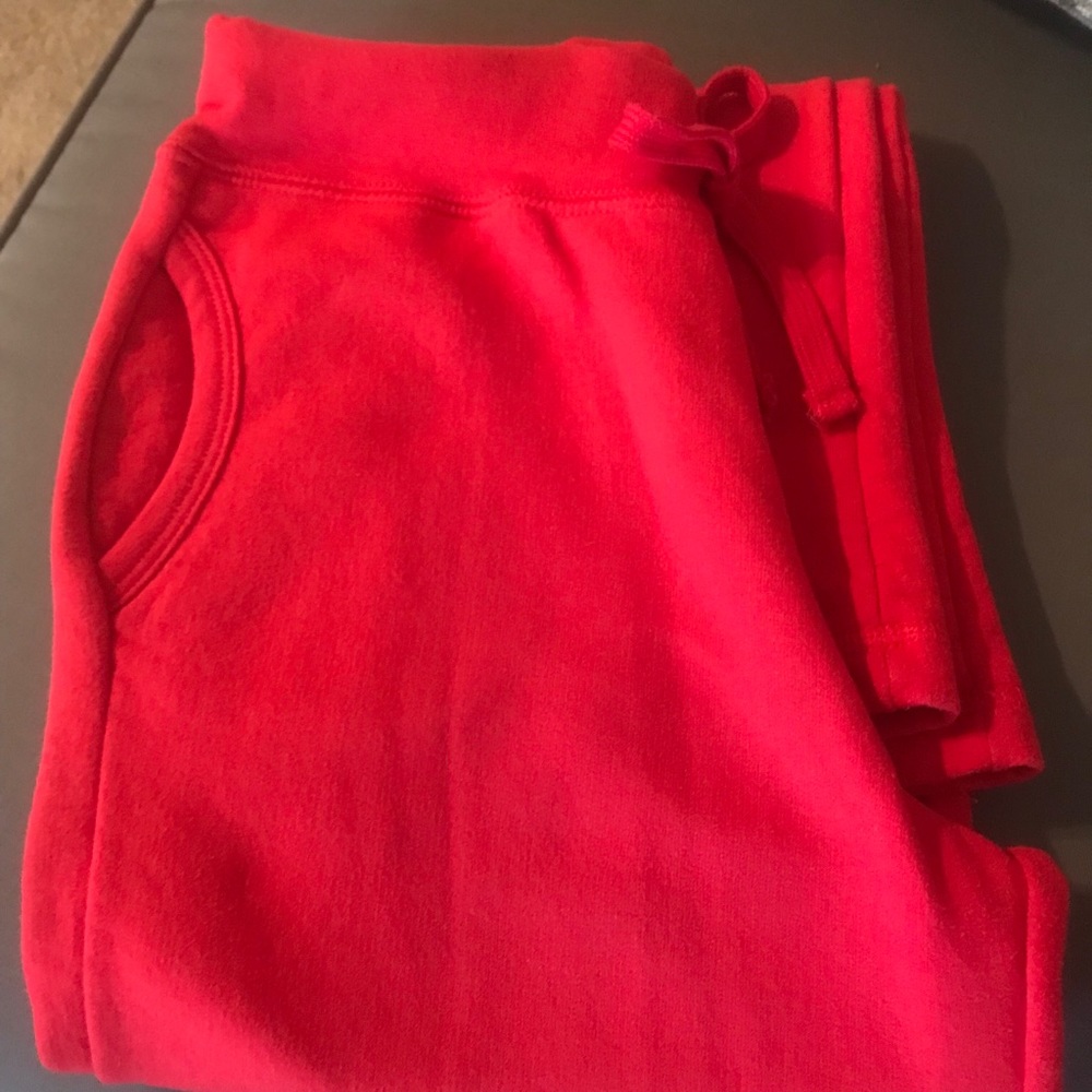 Red sweatpants